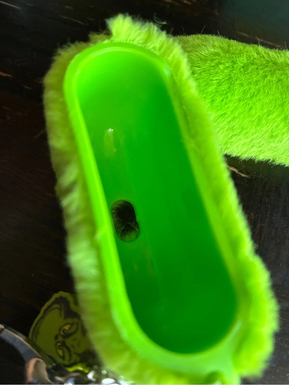The Grinch Plush AirPods Pro Case in Bright Green with Keyring